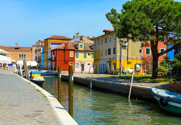 Colorful houses on the canal in Burano island Venice Italy