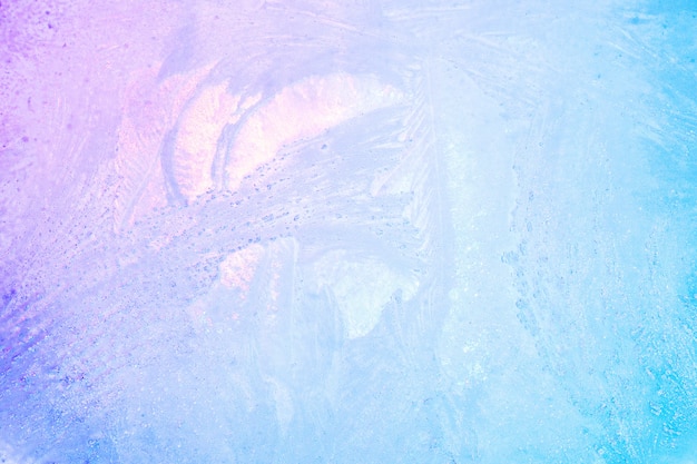 Colorful ice texture background. iridescent holographic bright colors of winter or ice for summer drinks