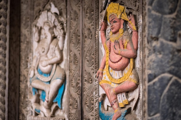 Colorful image of nepalese god on the wall kathmandu nepal