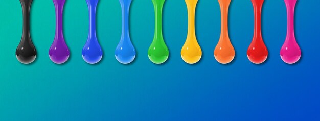 Colorful ink drops on blue background Horizontal banner