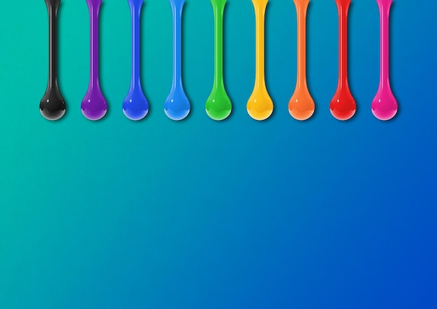 Colorful ink drops on blue background Horizontal wallpaper