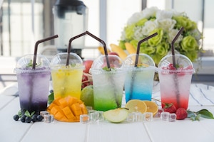 Colorful italian soda arranged on wood table