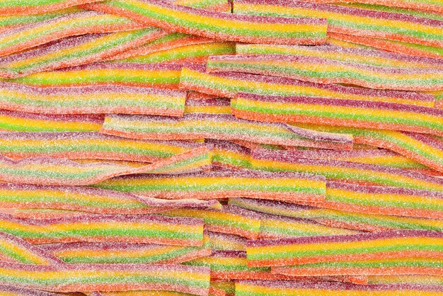 다채로운 젤리 콩 배경입니다. 젤리 사탕 패턴입니다.