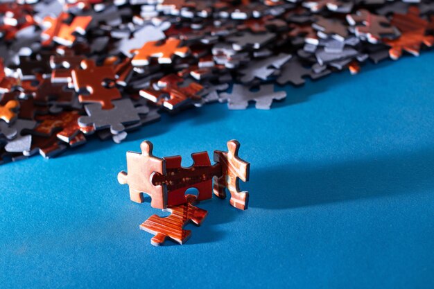 Colorful jigsaw puzzle on blue background