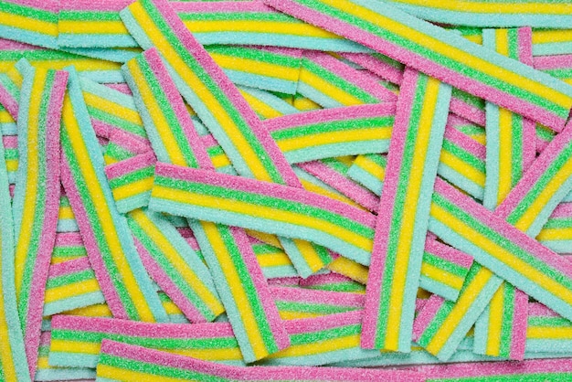 Sfondo di caramelle gommose succose colorate. vista dall'alto. dolci di gelatina.