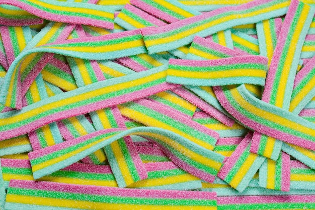 カラフルなジューシーなグミキャンディーの背景上面図ゼリーのお菓子