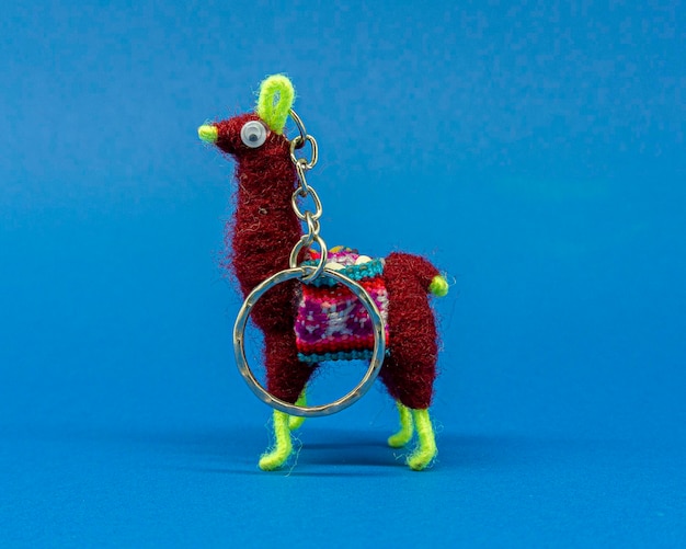 colorful keychain in the shape of an andean llama.