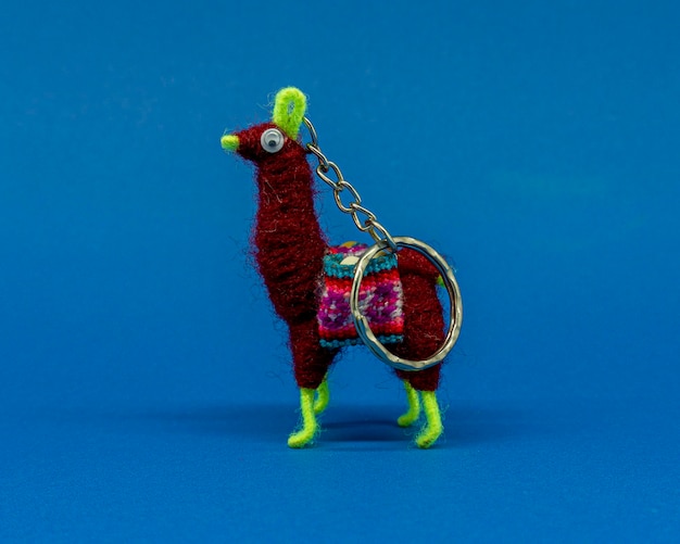 colorful keychain in the shape of an andean llama.