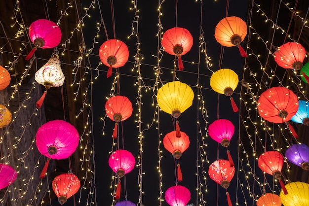 Colorful lanterns hang on the wall