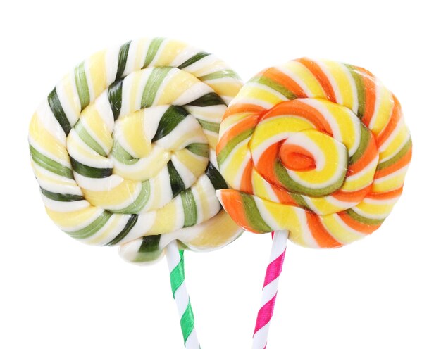 Colorful lollipops with ribbons isolated on white