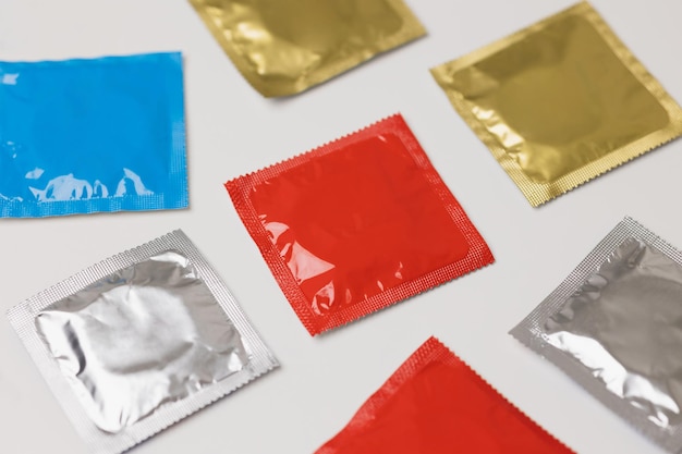 Colorful lot of condom put on the table Campaign for safe sex and contraception