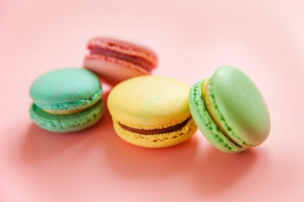 Colorful macaron on pink background