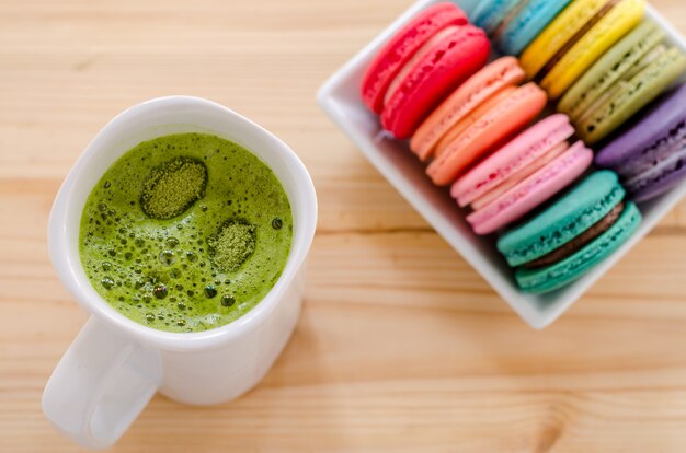 Colorful macarons and green tea