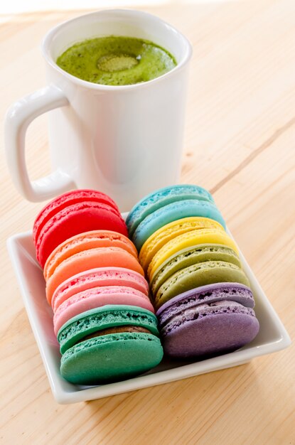 Colorful macarons and green tea