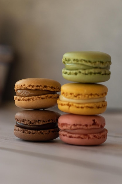 Colorful macaroons closeup on gray background selective focus