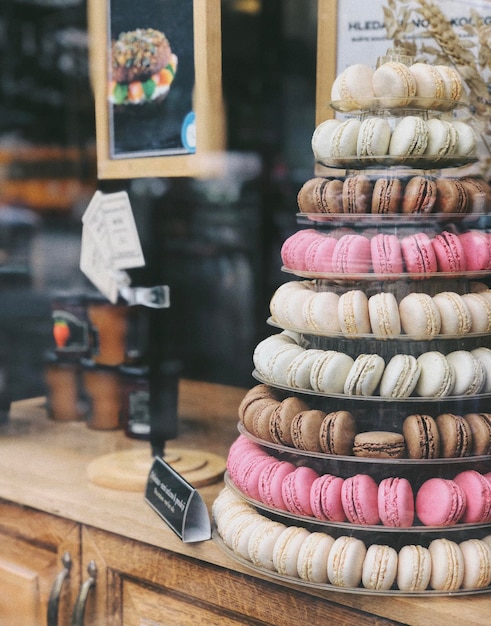 Colorful macaroons in the shop window of a French bakery