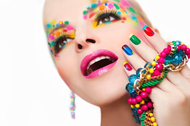 Colorful makeup and French manicure for girls