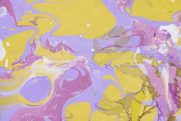 Colorful marble ink texture on watercolor paper background