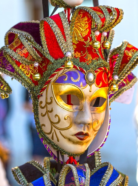 A colorful mask with the word venice on it