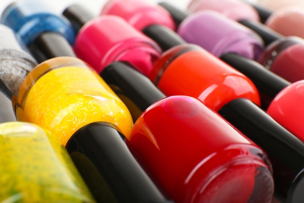 Colorful nail polishes closeup