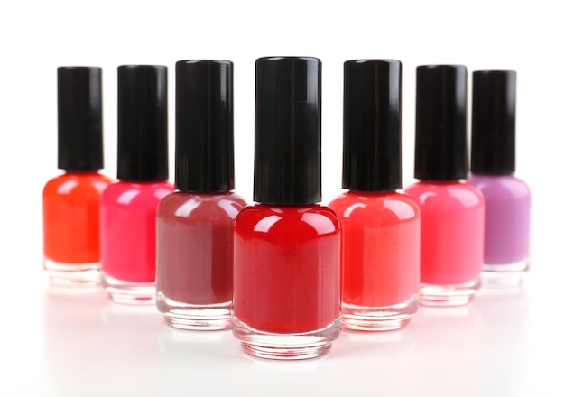 Colorful nail polishes isolated on white