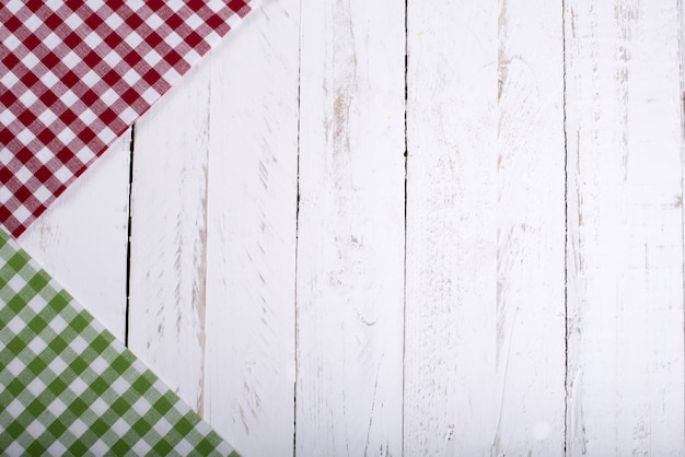 Colorful napkins on a white wooden board