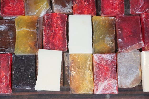 Colorful natural soap bar in a bowl