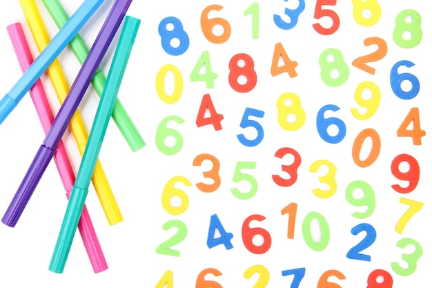 Colorful numbers and markers isolated on white