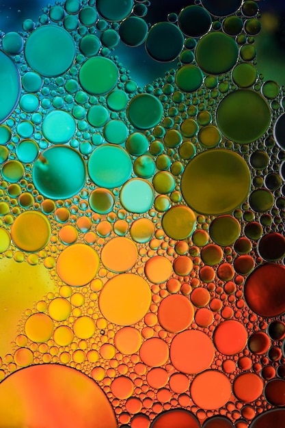 A colorful oil drop pattern is shown with the colors of the rainbow