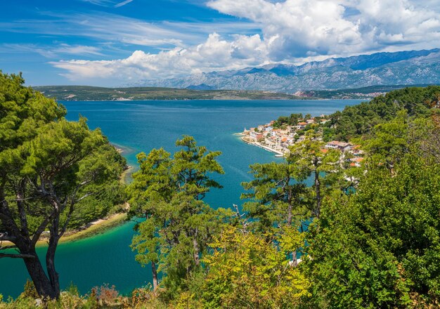 Colorful old village of Novigrad in Istria county of Croatia with blue river and harbor seen from the fortress