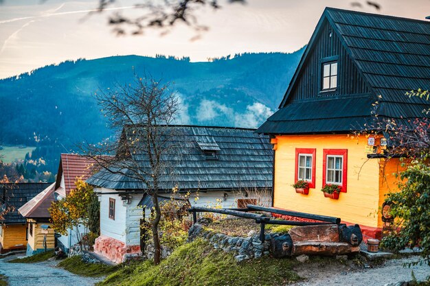 Colorful old wooden houses in vlkolinec unesco heritage mountain village with a folk architecture vlkolinec ruzomberok liptov slovakia