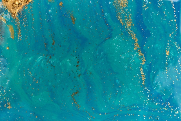 Photo colorful paint splashes with golden smudges