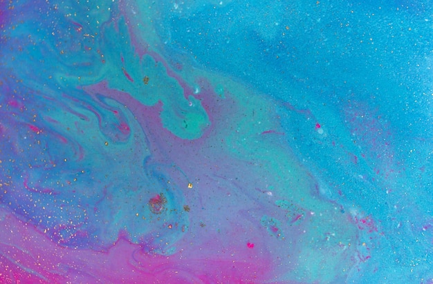 Colorful paint splashes with golden smudges