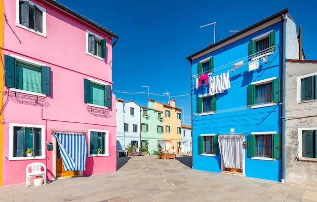 Colorful painted houses on Burano island near Venice Italy Scenic Italian street