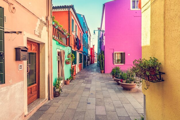 Colorful painted houses on Burano island near Venice Italy Scenic Italian street