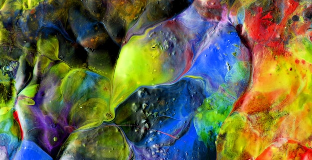 Photo a colorful painting of a green, blue, and yellow liquid.