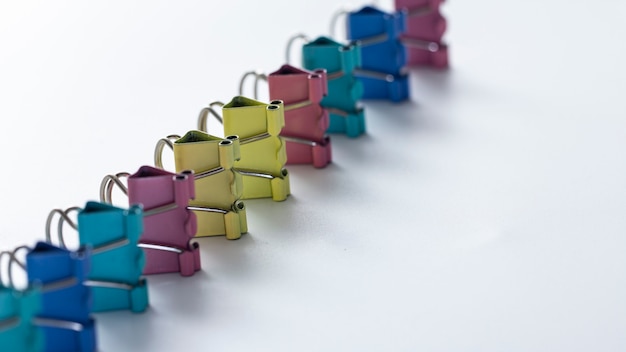 Photo colorful paper clip, desk office concept