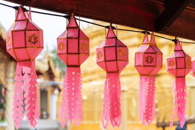 Colorful paper craft lantern festival at Wat Phra That Hariphunchai Lamphun Thailand