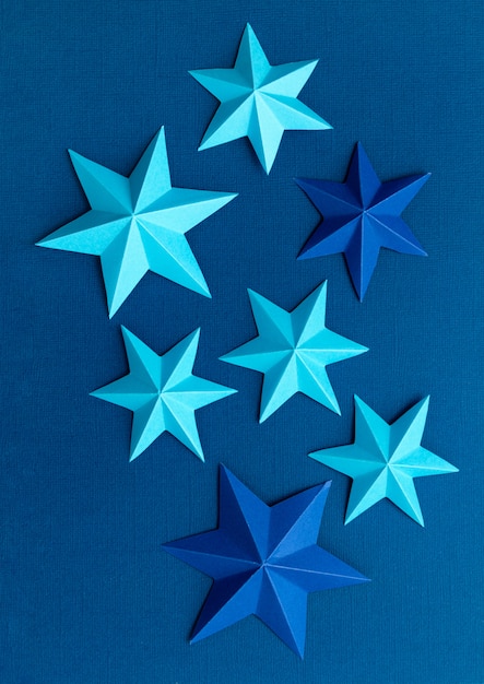  colorful paper origami stars. Holiday, celebration, birthday, greeting card, invitation, diy concept