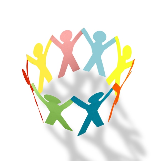 Photo colorful paper people in a circle holding hands