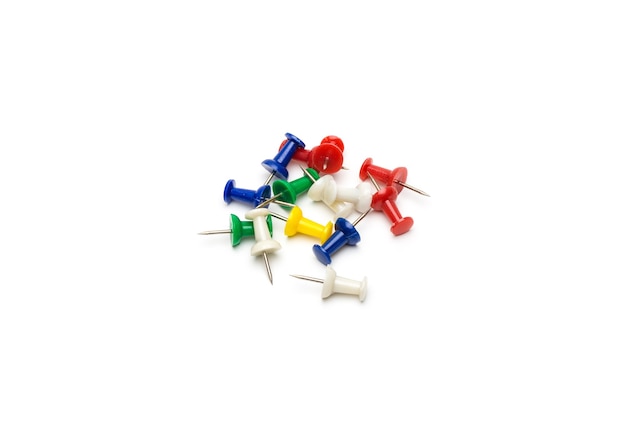 Colorful paper push pins on white background