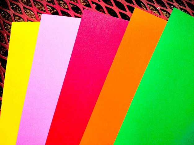 Colorful papers on metal