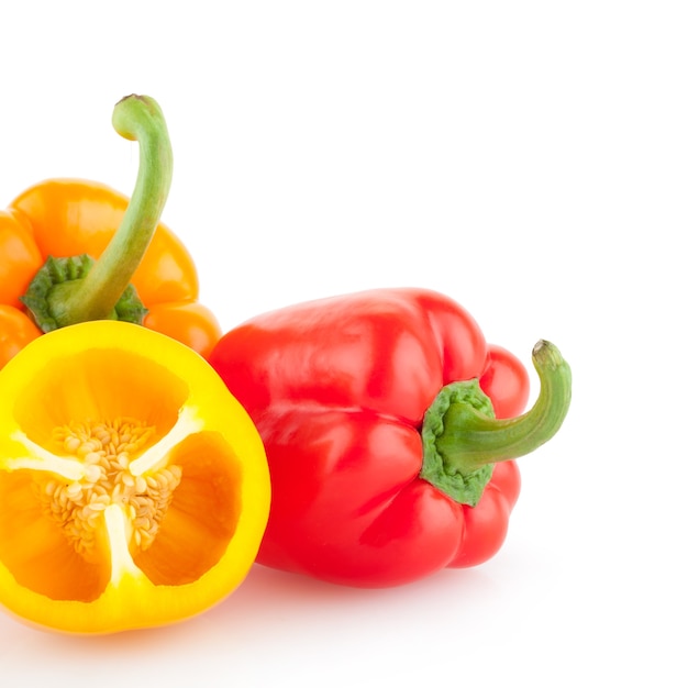 Colorful paprika peppers isolated on white background