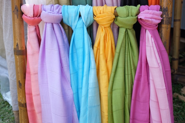 Colorful pashmina scarves at an outdoor market