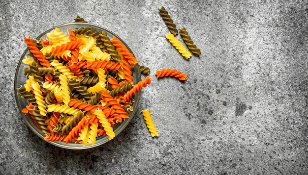 Colorful pasta in bowl