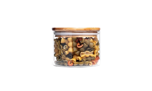Colorful pasta in a glass jar isolated.