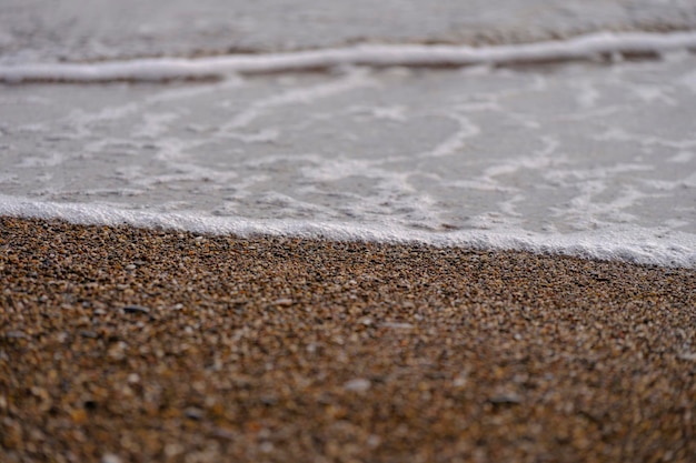 colorful pebbles and sea waves