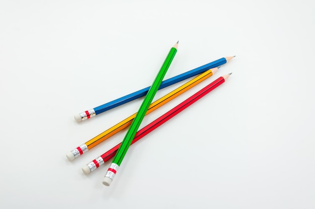 Colorful Pencil in fist power of written word on white background