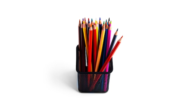 Colorful pencils in the organizer are isolated on a white background. High quality photo