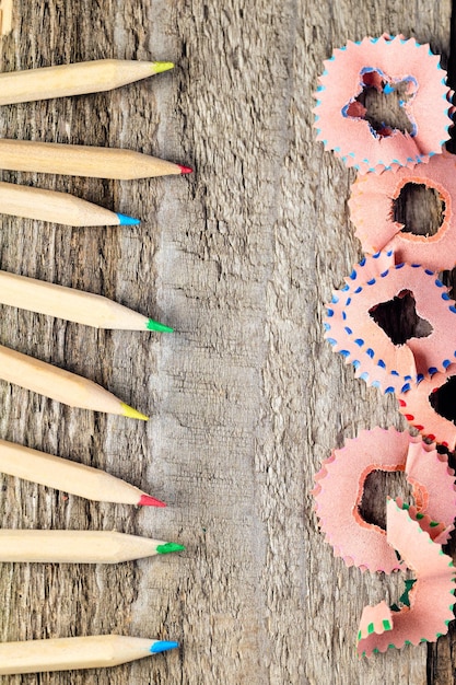 Colorful pencils and sharpening shavings vertical image